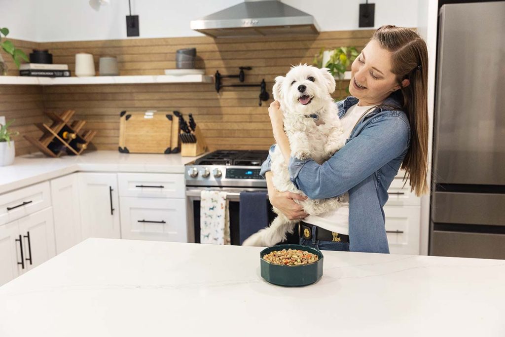 dog and human in kitchen. how to make fresh dog food