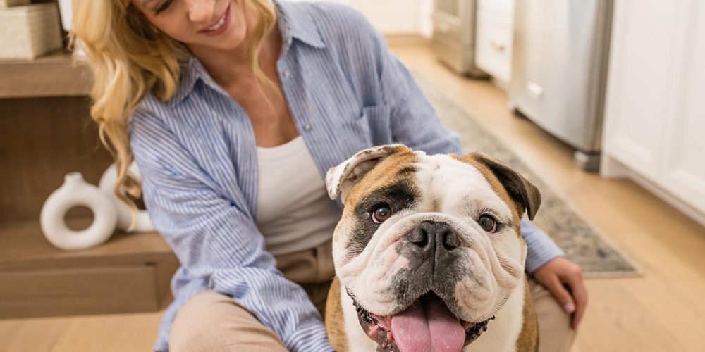 woman and bulldog